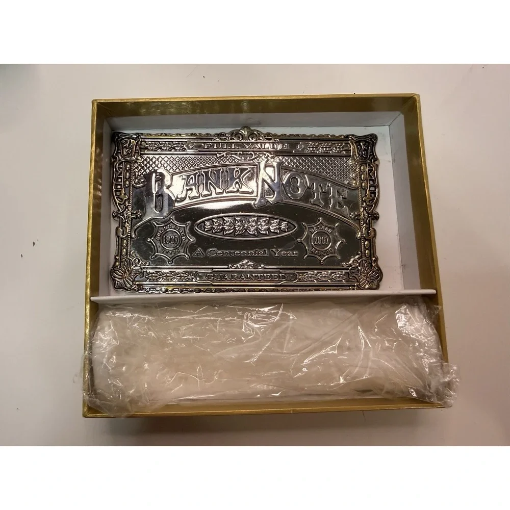 Neiman Marcus 2007 Bank Note Centennial Silver Tone Calendar Collectible